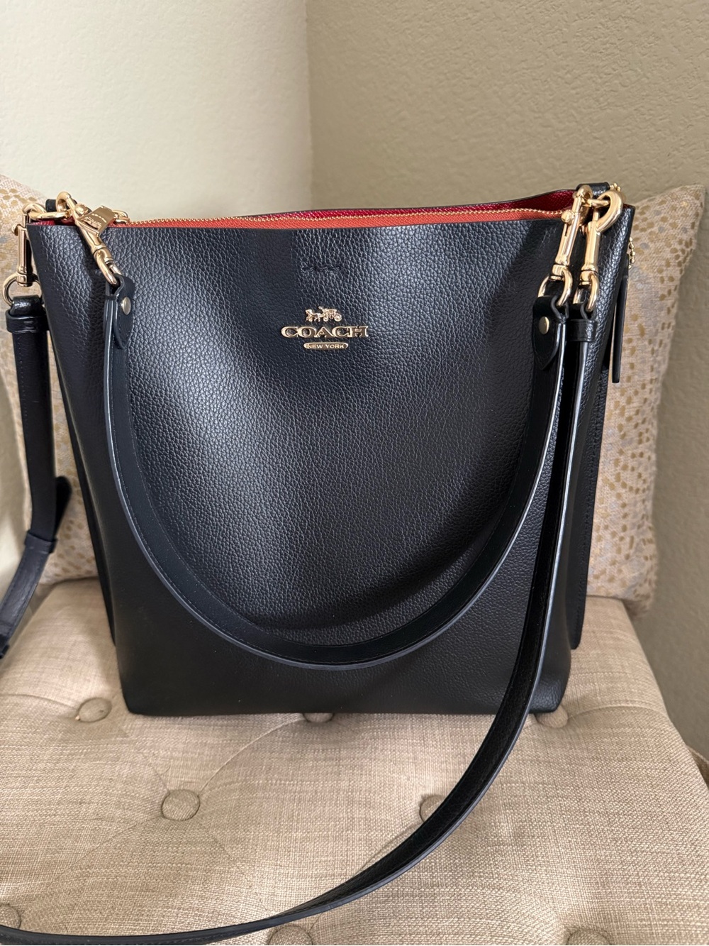 COACH Black Leather Shoulder Bag with Red Interior Trim